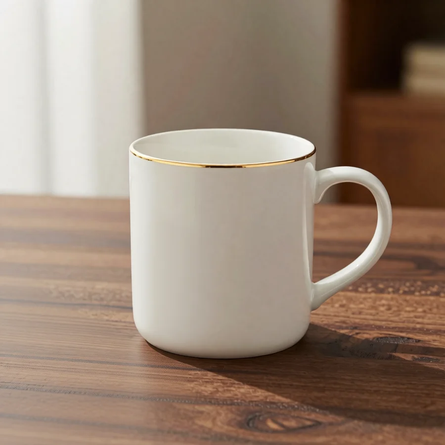 The white mug alone on the walnut table
